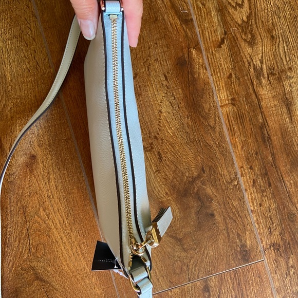 NWT Kate Spade Sadie Crossbody it’s in a “Crisp Sky” blue. It’s very light blue - Picture 9 of 11